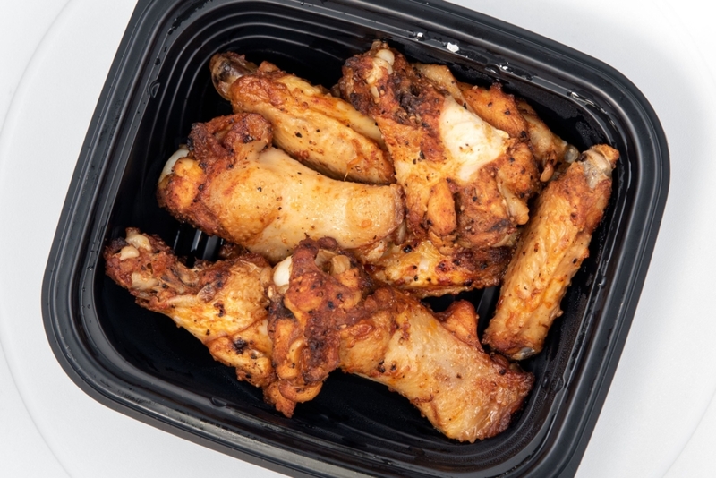 Little Caesars Chicken Wings | Alamy Stock Photo Photo by Jon Osumi