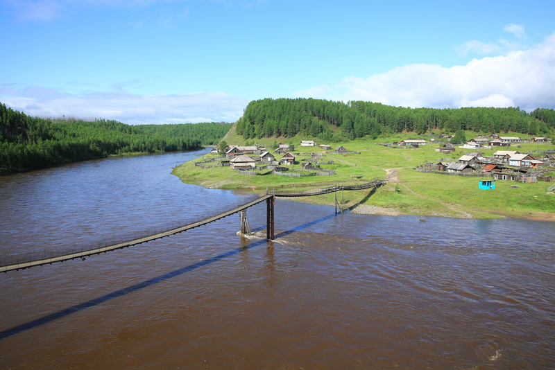 Vitim River Bridge, Russia | Shutterstock Photo by ANDREI RASPUTIN