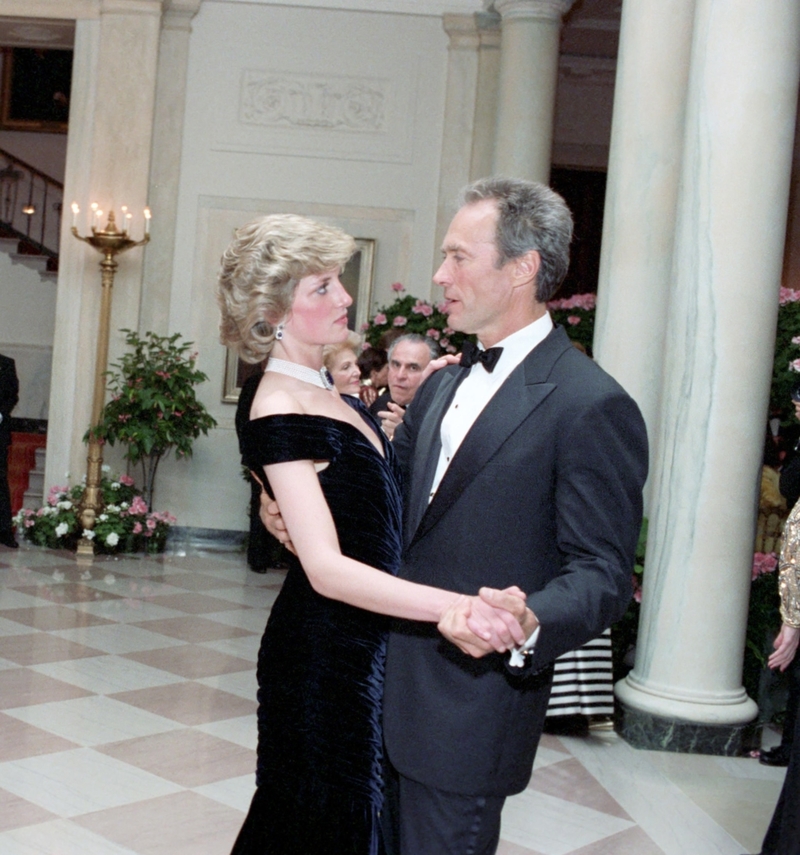 The Princess and Clint Eastwood Share an Awkward Moment | Alamy Stock Photo by Consolidated News Photos/Mary Anne Fackelman-Courtesy Ronald Reagan Library via CNP/dpa picture alliance