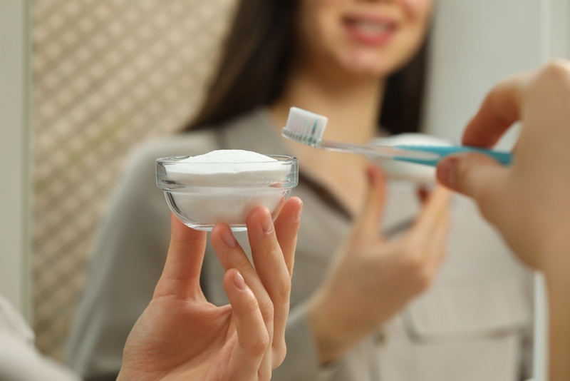 Get Whiter, Brighter Teeth | New Africa/Shutterstock