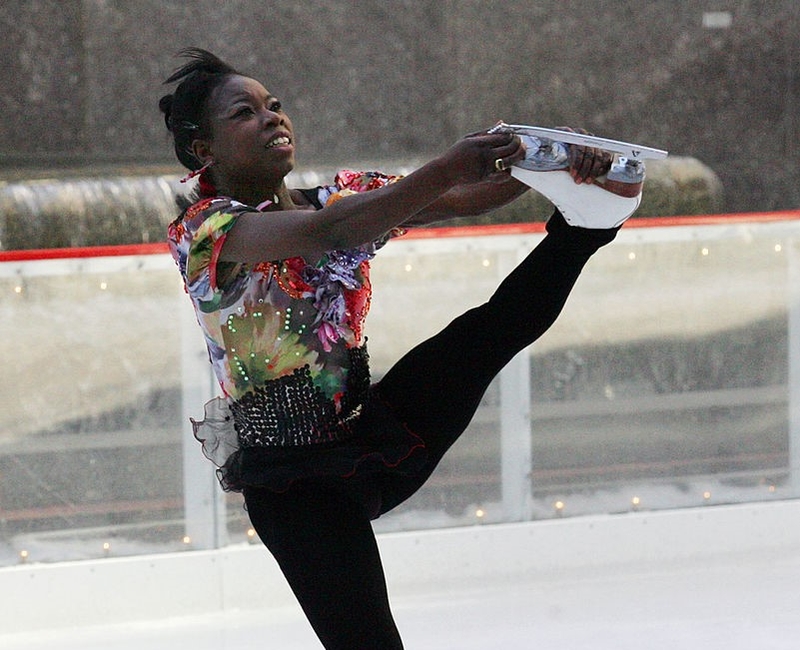 Surya Bonaly | Getty Images Photo by Astrid Stawiarz