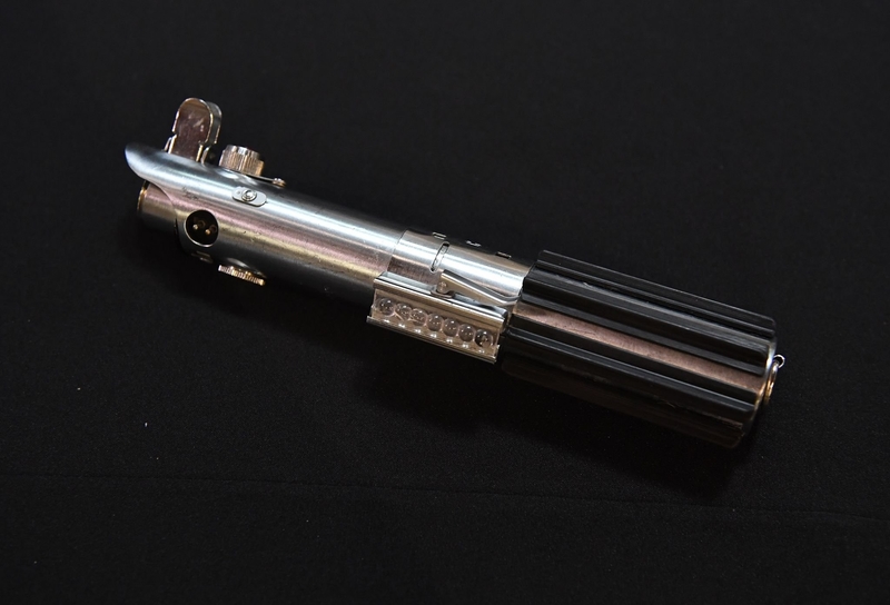 Luke Skywalker’s Lightsaber | Getty Images Photo by Mark RALSTON/AFP