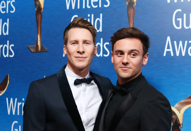 Dustin Lance Black y Tom Daley | Getty Images Photo by Michael Tran/FilmMagic