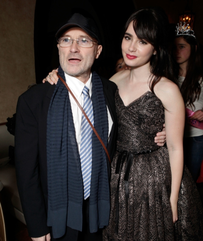 Phil Collins y Lily Collins | Getty Images Photo by Todd Williamson