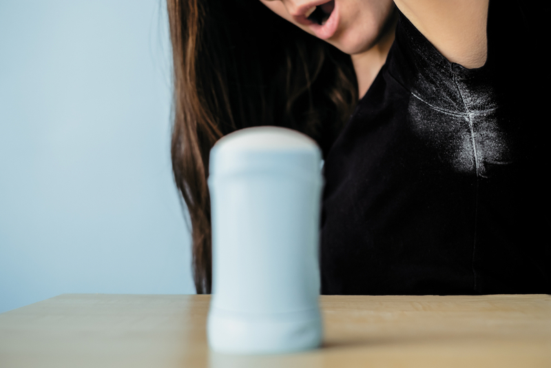 Get Tough on Sweat Stains | Shutterstock Photo by HalynaRom