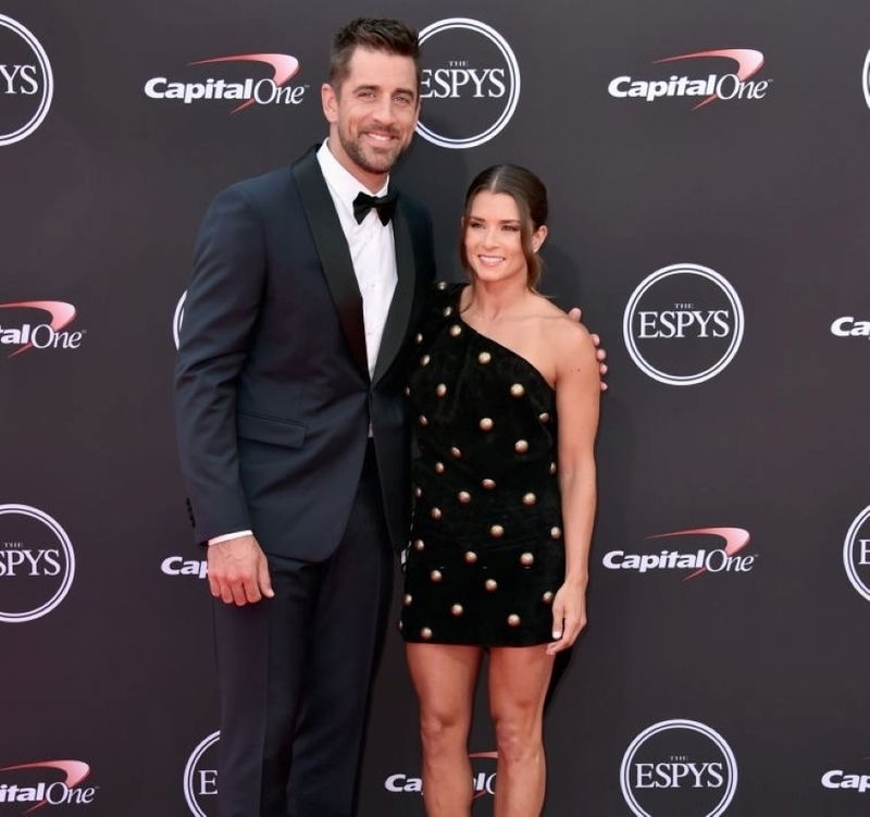  Danica Patrick & Aaron Rodgers | Getty Images Photo by Alberto E. Rodriguez