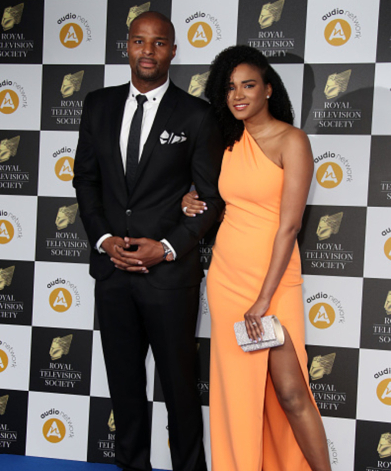 Leila Lopes & Osi Umenyiora | Getty Images Photo by Mike Marsland/WireImage