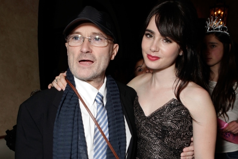 Phil Collins & Lily Collins | Getty Images Photo by Todd Williamson