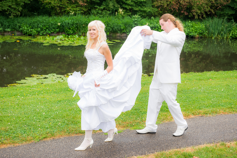 Cheeky Groom | Getty Images Photo by gabalogh