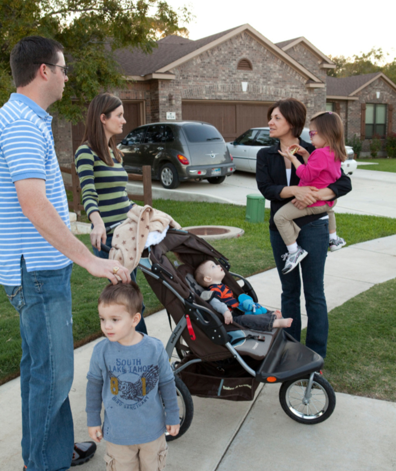 Parentalidade Comunitária | Alamy Stock Photo by Bob Daemmrich