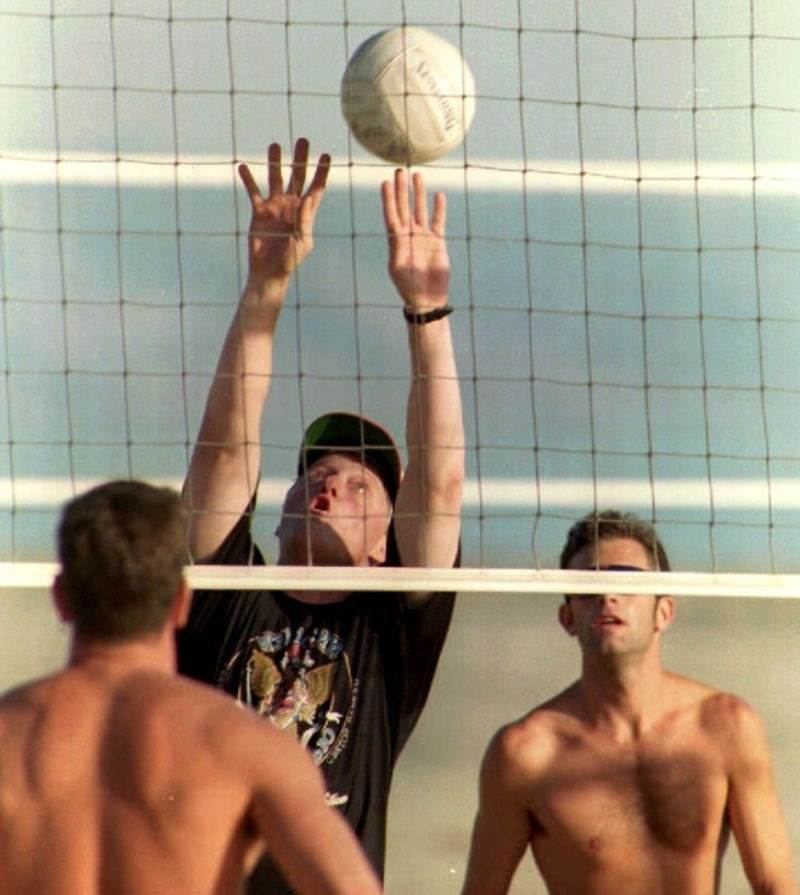 Bill Clinton at the Beach | Getty Images Photo by PAUL RICHARDS/AFP