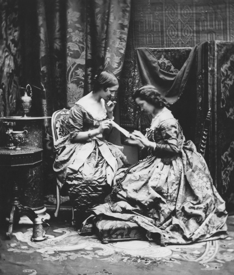 A Lady, A Letter and A Friend | Getty Images Photo by London Stereoscopic Company/Hulton Archive