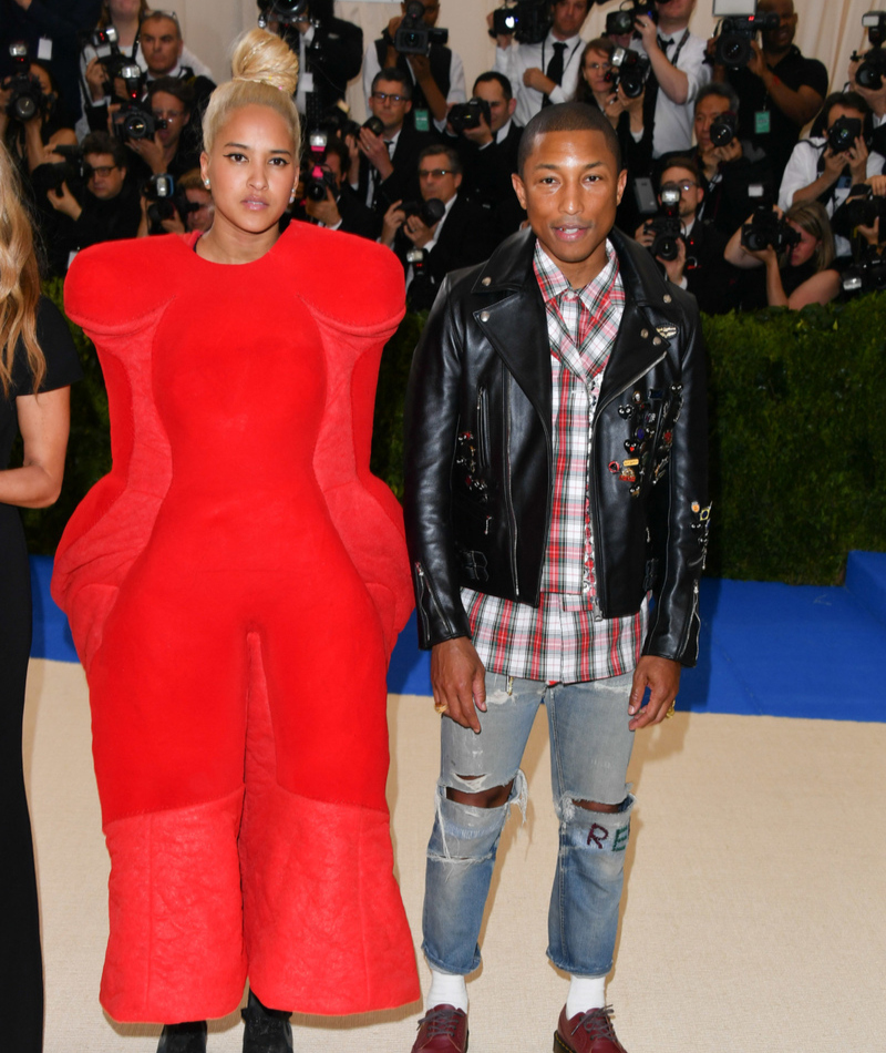 Pharrell Williams y Helen Lasichanh | Getty Images Photo by George Pimentel/WireImage