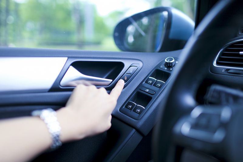 Opening the Car Window | rickyd/Shutterstock