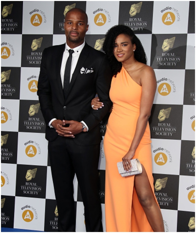 Leila Lopes & Osi Umenyiora | Getty Images Photo by Mike Marsland/WireImage