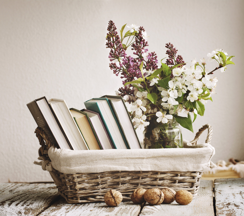 Store Books in Rattan Planters | Shutterstock Photo by savitskaya iryna