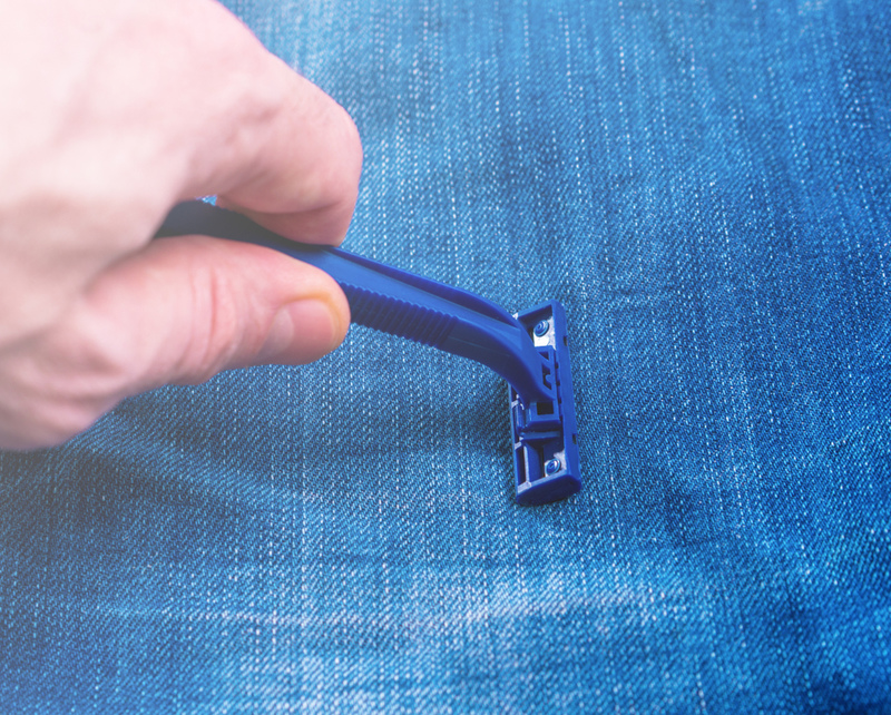 Use a Razor for Perfectly Distressed Denim | Shutterstock