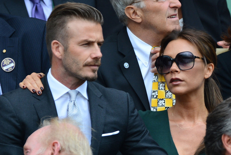David and Victoria Beckham | Getty Images Photo by LEON NEAL/AFP